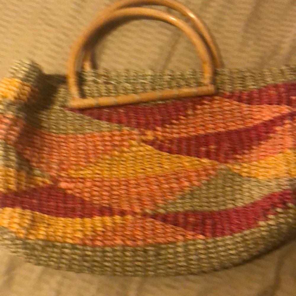 Straw purse with wooden handles